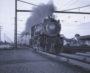 Pennsylvania Railroad | Tullytown, Pennsylvania | Class 4-4-2#1642 steam locomotive | Passenger train | June 25, 1939 | C. Norman Lippincott photograph