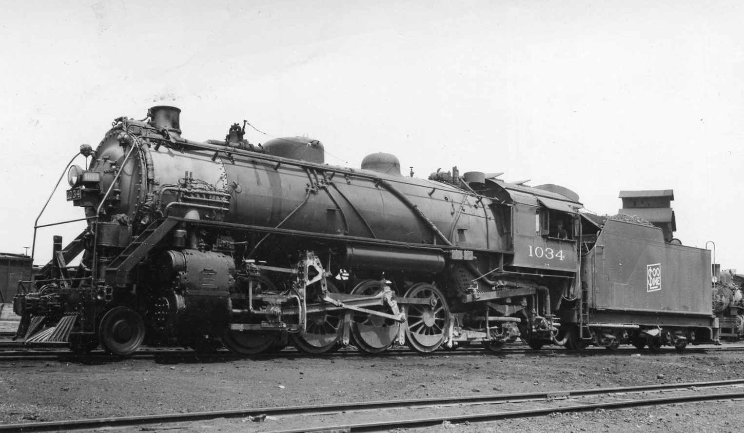 Soo Line | Minneapolis, Minnesota | Class 2-8-2 #1034 steam locomotive | 1940 | Arthur B. Johnson photograph | Elmer Kremkow collection
