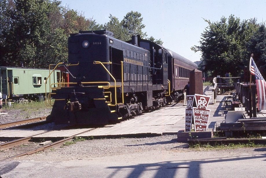 Southwest Pennsylvania Railroad | ex — Pennsylvania Railroad | Youngwood, Pennsylvania | Alco Class S2 #5656 diesel-electric locomotive | Tourist passenger train | July 21, 2002 | Dick Flock photograph