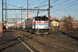 Amtrak | Elizabeth, New Jersey | Class GE E60 #963 electric motor | southbound pasenger train | November 1976 | William Rosenberg photograph