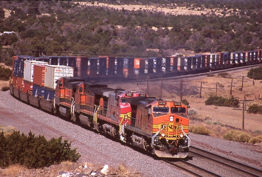 BNSF | Winona, Arizona | GE C44-9W #4416, 682, 1015,1000 diesel-electric locomotives | telephoto picture | double stack train | May 4,2006 | Dick Flock photograph