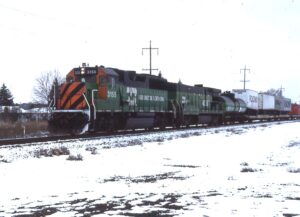 Burlington Northern | Spokane, Washington | EMD GP503155 = GE B30-7AB #4007 diesel-electric locomotives | eastbound freight | November 24, 1988 | Dick Flock Photogfraph