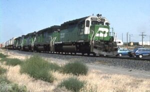 Burlington Northern | Pasco, Washington | EMD SD40G #7307, EMD SD40-7 7045, GE B30-7AB, + SD40-2 7016 diesel-electric locomotive | September 12, 1993 | Dick Flock photograph