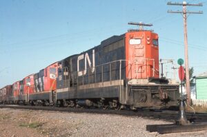 Canadien Nationel | Bishop Falls, Newfoundland, Canada | GMD GR-12-p #926 + 3 narrow gauge diesel-electric locomotives | September 1976 | Larry Steingarten photograph