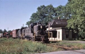 Pennsylvania Railroad | Oaks, Pennsylvania | Class Alco RS3 #8550 diesel-electric locomotive | Passenger station | local freight | June 17, 1966 | Dave Augsburger photograph