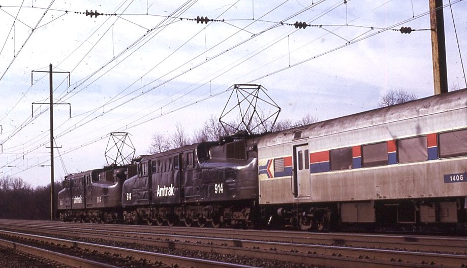 Amtrak | Monmouth Junction, New Jersey | Altoona Works Class GG1 #904 and 914 electric motors | Passenger train | January 1976 | Larry Steingarten photograph