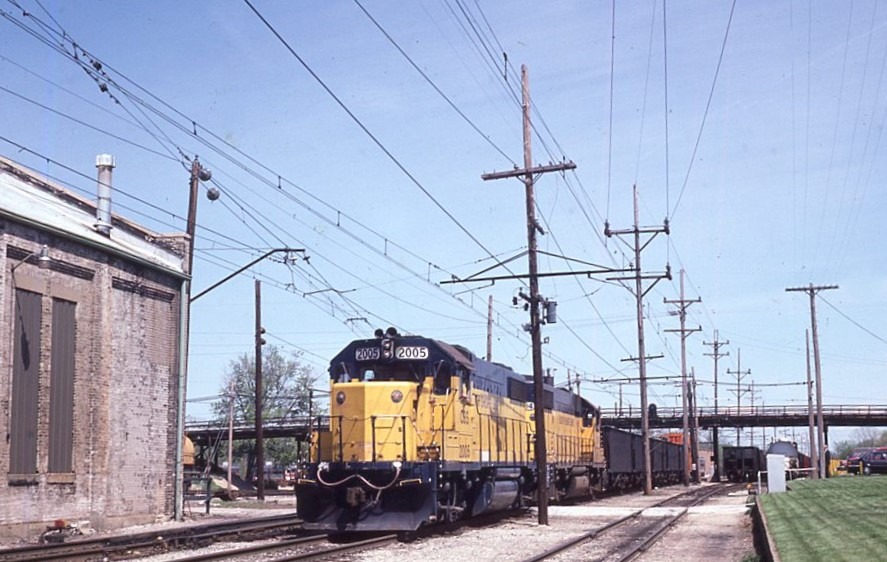 Chicago South Shore and South Bend | Michigan City, Indiana | EMD GP38 #2005 and 2004 diesel-electric locomotives | Coal Train | Michigan City Shops | May 7. 1987 | James P. Shuman photograph | Morning Sun Books Collection