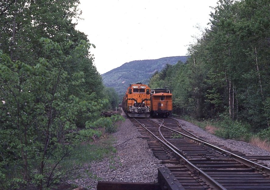 Maine Central | Bartlett, New Hampshire | EMD GP38 #258 diesel-electric locomotive | Caboose #C672 | May 23, 1982 | Richard B. Gassett photograph | John Wilson collection