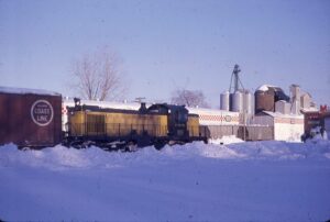 Chicago and Northwestern | Mason City, Iowa | Alco RS3 #211 diesel-electric locomotive | winter switching | March 8, 1962 | Thorn Marty photograph | Morning Sun Books collection