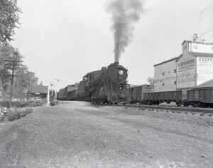 Canadien National | Dorion, Quebec, Canada | Class 2-8-0 #2565 steam locomotive | freight train | Dorion Station | June 19, 1953 | R.L. Long photograph | West Jersey Chapter Collection