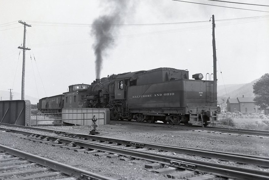 Baltimore and Ohio | Salamanca, New York | Class 2-8-0 #709 steam locomotive | Caboose #C2626 | June 19, 1953 | R.L. Photograph | West Jersey Chapter NRHS Collectionoto