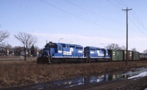 Conrail | Newport, Minnesota | Burlington Northern train | EMD SD38 #6964 and 6968 diesel-electric locomotives | March 23, 1993 | Dick Flock photograph
