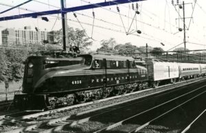 Amtrak | Pennsylvania Railroad | Trenton, New Jersey | Altoona Works Class GG1 #4935 electric motor | Restored Inaugural run | Passenger train | May 15, 1977 | Frank Tatnall photograph