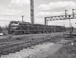 Erie Lackawanna | Marion, Ohio | EMD F3a #8034+ Alco FB #7323, 7302 and FA #7361 diesel electric locomotive | 1963 | Elmer Kremkow photograph