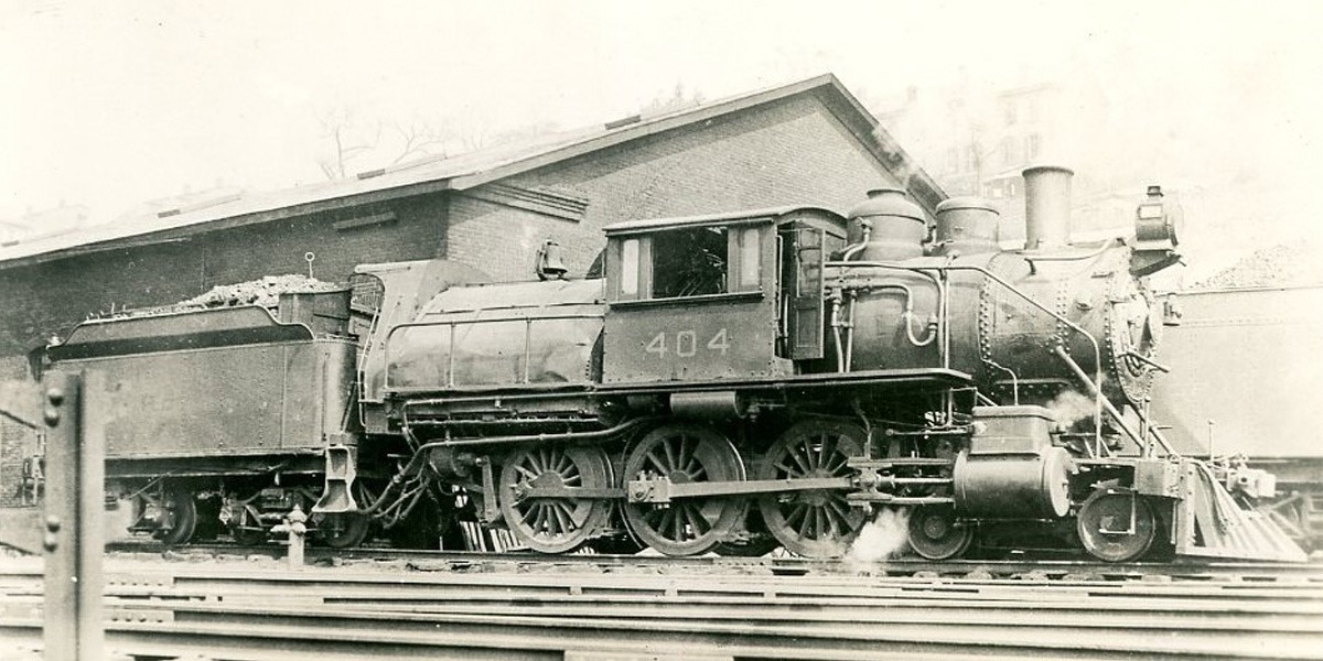 Central Railroad of New Jersey | unknown location | Class L2 4-6-0 #404 Rogers Camelback steam locomotive | 1910 | unknown photographer | Warren Crater, Friends of the NJ Transportation Museum