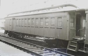 Central Railroad of New Jersey | Jersey City | Wood body passenger combine coach car #1163 | 1900 | H.W. Smith photograph | Warren Crater, Friends of the New Jersey Transportation Museum collection