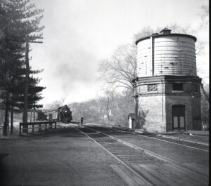 New York Central | Mount Hope, New York | Putnam Division | Steam commuter train | Water Tower | April 1951 | Fielding Lew Bowman photograph