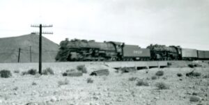 Atchison Topeka and Sante Fe Railroad | Bagdad, California | Class 2-10-2 #2929 + 1 steam locomotives | on freight | March 1941 | West Jersey Chapter, NRHS collection