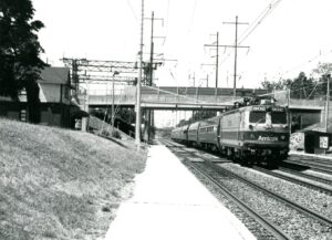 Amtrak | Folcroft, Pennsylvania | EMD AEM-7 #902 motor | Amtrak Passenger train #902 | July 1997 | Will Coxey photograph
