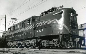Amtrak | ex Pennsylvania Railroad | Wilmington, Delaware | Altoona Works Class GG1 #4935 motor | Fresh paint | May 11, 1935 | Homer Hill photograph