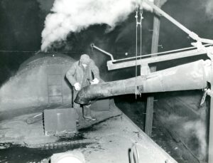 Indiana Railroad | Calumet City, Illinois | Hostler watering Steam Locomotive | 1943 | Jack Delano photograph