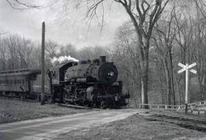 New York Central | Goldens Bridge, New York | 4-6-0 # 1250 steam locomotive | Passenger train | coming off Lake Mahopac Branch | July 1951| Fielding Lew Bowman photograph