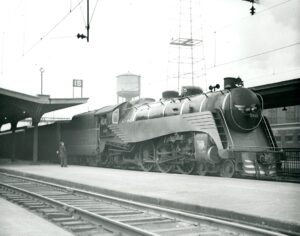 Delaware Lackawanna and Western Railway | Hoboken, New Jersey | Class 4-6-2 #1115 streamlined steam locomotive | Merchants Limited Passenger Train | April 10, 1939 | Howard Johnston photograph | North Jersey Chapter, NRHS collection