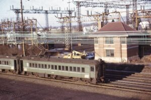 Penn Central Transportation Company | Monmouth Junction, New Jersey | MP54 commuter car #412 | Midway Tower | January 1974 | Larry C. Steingarten photograph