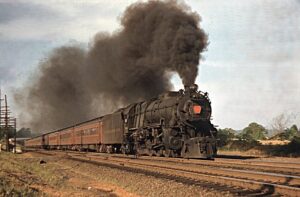 Pennsylvania Railroad | New York and Long Branch | Matawan, New Jersey | Altoona Works class K4s #3638 steam locomotive | Commuter train | July 1955 | Tom Donahue photograph | Richard Prince Collection