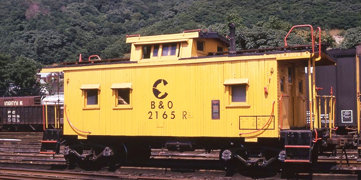Chessie System | Baltimore and Ohio Railroad | Benwood, West Virginia | wood sided caboose #2165-R | July 5, 1969 | David Hamley photograph | Morning Sun Books collection