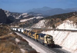 Atchison Topeka and Sante Fe Railway | Cajon, California | EMD GP40 #3808 + 3 diesel-electric locomotives | Eastbound TV Train | September 1, 1994 | Carl Perelman photograph | Frank Etzel collection