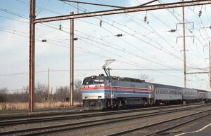 Amtrak | Edison, New Jersey | GE E60CP #950 electric motor | Westbound Clocker | February 1976 | Jack de Rosset photograph | Morning Sun Books collection