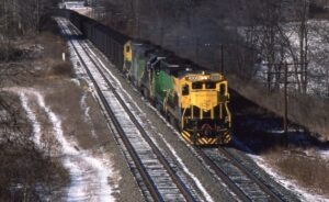 New York Susquehanna and Western Railroad | Bainbridge, New York | GE B40-8 #4006 + 4 diesel-electric locomotives | Hopper train | January 22, 1989 | Carl Perelman photograph | Frank Etzel collection