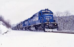 Norfolk Southern Corporation | Summerhill, Pennsylvania | EMD SD40-2 #3322 and #3332, GEW D9-40CW #9544 and #9673 diesel-electric locomotives | eastbound | January 5, 2003 | Dick Flock photograph / collection