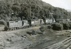 Penn Central Transportation Company | East Pennsboro Township, Pennsylvania | north end Enola yard | EMD GP9 #7111, GP35 #2363 and GP40 #3077 diesel-electric locomotives | from Iron Bridge | 1971 | Ed Kaspriske photograph / collectioon