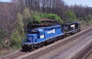 Norfolk Southern Corporation | South Fork, Pennsylvania | EMD SD40-2 #3339 and #3374 diesel-electric locomotives | passing abutment of flyer bridge | May 4, 2002 | Dick Flock photograph / collection