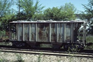 Conrail | Pennsylvania Railroad | Birmingham, Michigan | 2-bay covered hopper #257117 | May 15, 1977 | Emery Gulash photograph | Stephen Timko collection
