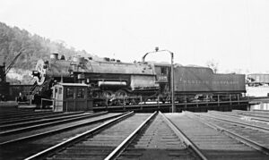 Western Maryland Railway | Cumberland, Maryland | Class I2 2-10-0 #1115 steam locomotive | left side on turntable | October 5, 1938 | unknown photographer | West Jersey Chapter, NRHS Collection