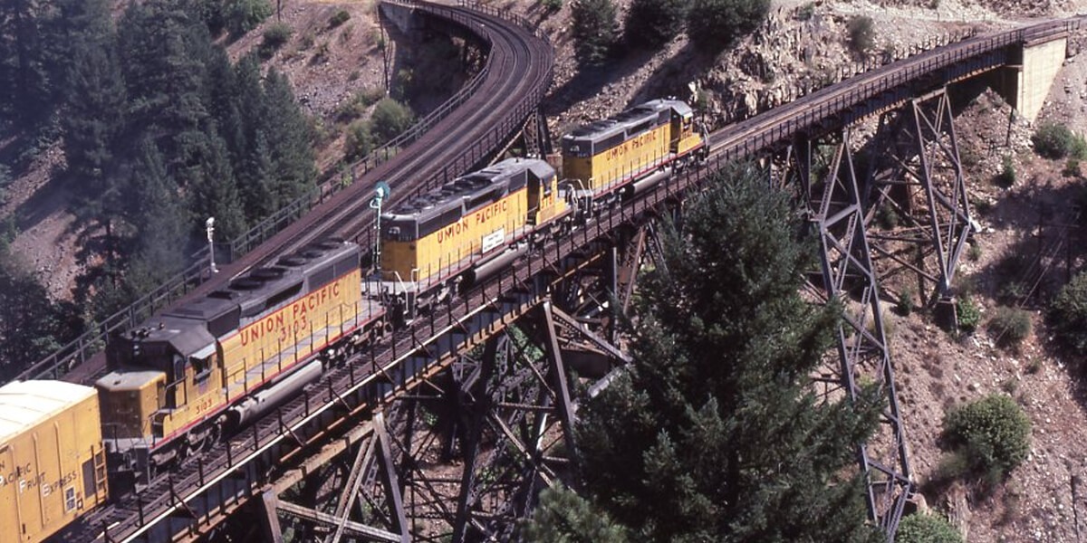 Union Pacific Railroad | Keddie, California | EMD SD40-2 #3645, #3781, and #3103 diesel-electric locomotives | Keddie Wye Trestle | August 20, 1983 | Mitchell E. Dakelman photograph / collection