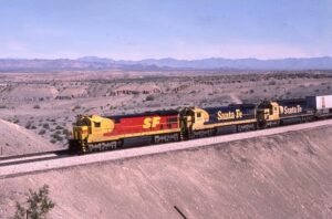 Atchison Topeka and Sante Fe Railway | ATSF | West Topac, California | GE C30-7 #8164 “Kodachrome scheme” + 2 diesel-electric locomotives | freight train | February 17, 1987 | Glen P. Koshiol photograph | Stephen Timko collection