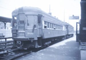 Chicago, Aurora and Elgin Railroad | Wheaton, Illinois | Interurban street cars #700 and #427 | at Wheaton station | July 2, 1949 | Al Creamer photograph | North Jersey Chapter, NRHS collection