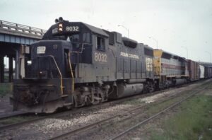 Conrail | Detroit, Michigan | Penn Central EMD GP38-2 #8032 and Erie Lackawanna SD45 #3623 diesel-electric locomotives | June 1976 | Elmer Kremkow photograph / collection