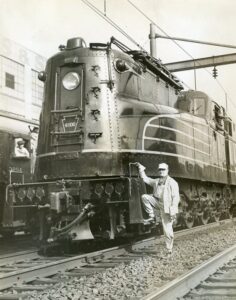 Pennsylvania Railroad | Philadelphia, Pennsylvania | GE / Baldwin GG1 #4800 electric motor with engineer | 1934 | UPI Photograph | Ed Kaspriske collection
