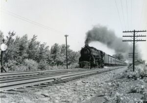 Pennsylvania Reading Seashore Lines | Ancora, New Jersey | Pennsylvania Railroad K4s 4-6-2 #5022 steam locomotive | Atlantic City train | at track pans | July 20, 1953 | R.L. Long photograph | West Jersey Chapter, NRHS Collection