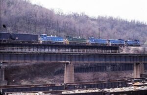 Union Railroad | Braddock, Pennsylvania | EMD MP15DC #24, MP15 #17, MP15DC #22, MP15 #16 and MP15DC #27 diesel-electric locomotives | on trestle | April 9, 2003 | Dick Flock photograph / collection