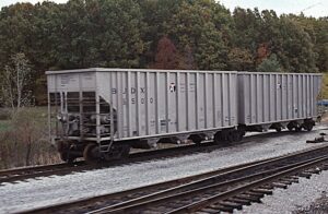 BUDX | Budd Company | Brewster, Ohio | Articulated hopper car #5500 | October 12, 1991 | Dick Flock photograph / collection