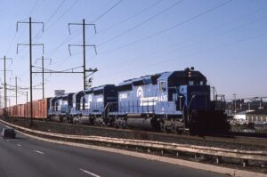 Conrail | Newark, New Jersey | EMD SD40-2 #6435 + 2 diesel-electric locomotives | eastbound Passaic and Harsimus Line | freight train | December 1986 | Frank Etzel photograph / collection