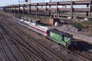 Massachusetts Bay Transit Authority Commuter Rail | MBTA | Boston, Massachusetts | EMD GP9 #1925 diesel-electric locomotive | Commuter train with RDC’s | September 1986 | Frank Etzel photograph / collection