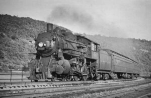 Pittsburgh and Lake Erie Railroad | College, Pennsylvania | Class 4-6-0 #9222 steam locomotive | Pittsburgh bound passenger train | 1946 | unknown photographer | Elmer Kremkow collection