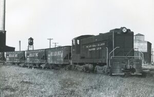 Pennsylvania Reading Seashore Lines | Camden, New Jersey | Baldwin S12 #6021 diesel-electric locomotive | switching Reading Bulsen Street Yard | January 1965 | Will Coxey photograph / collection | 5 x 7 BW print